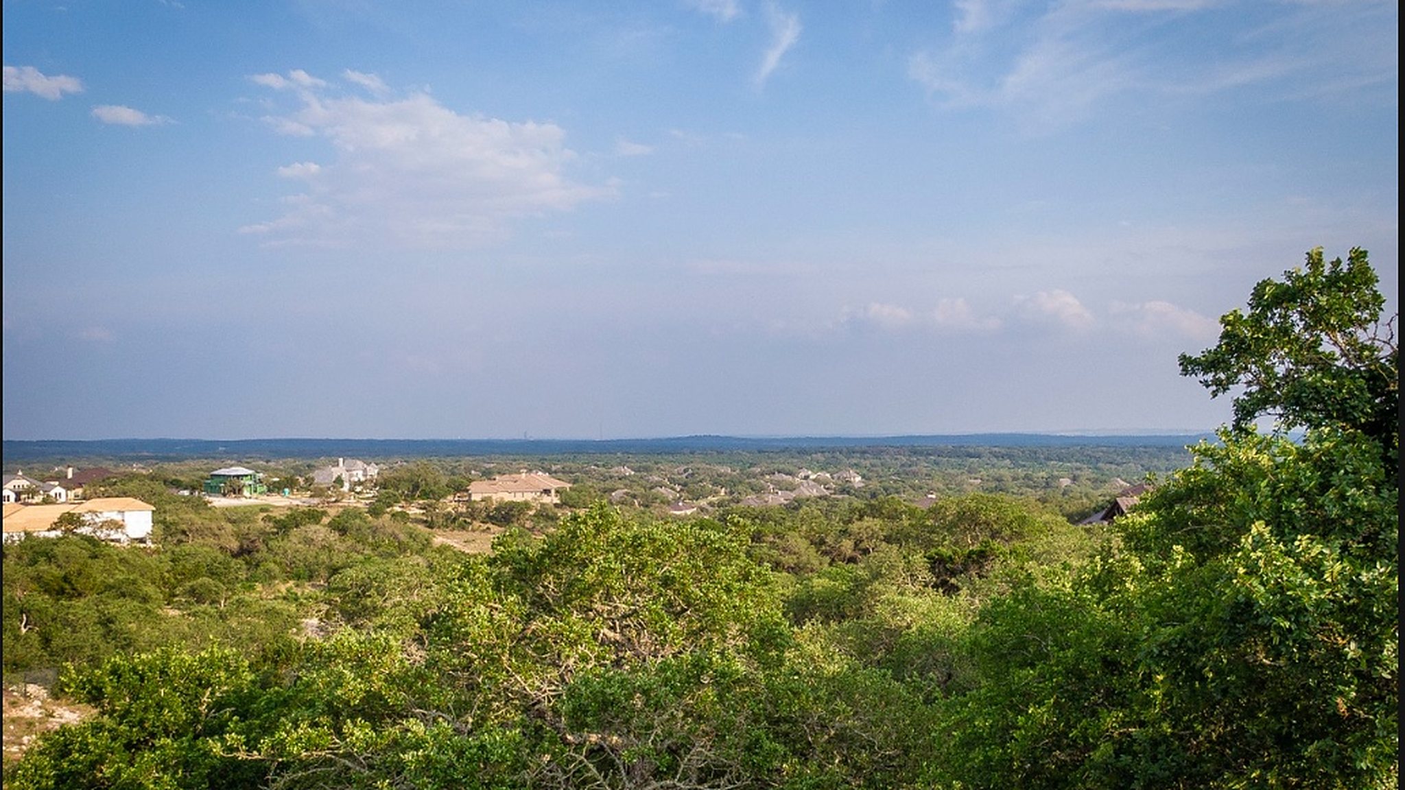 Southeast outlook from the Copper Crest lots over the wooded Texas Hill Country